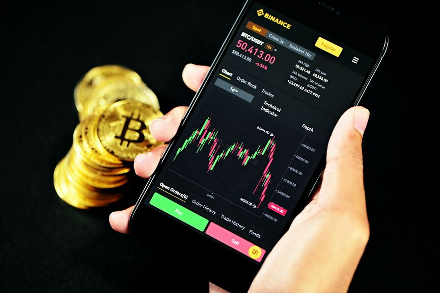 Capture d’écran de l’application Binance montrant le cours des cryptomonnaies.